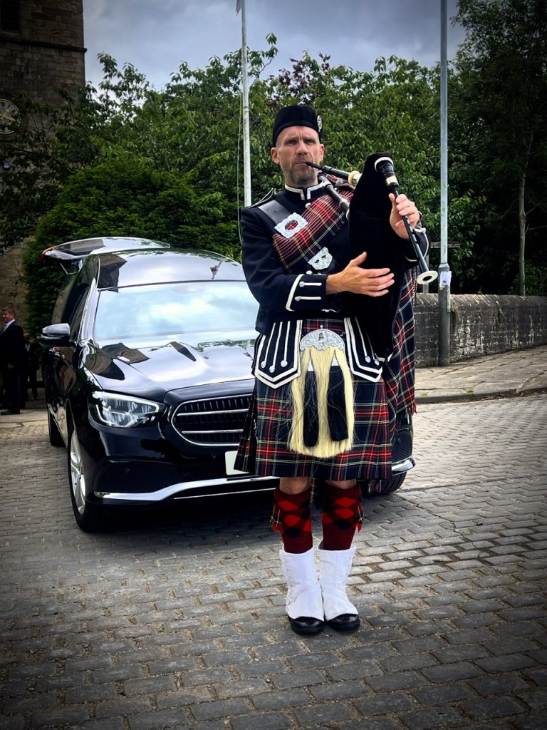 Manchester funeral bagpiper