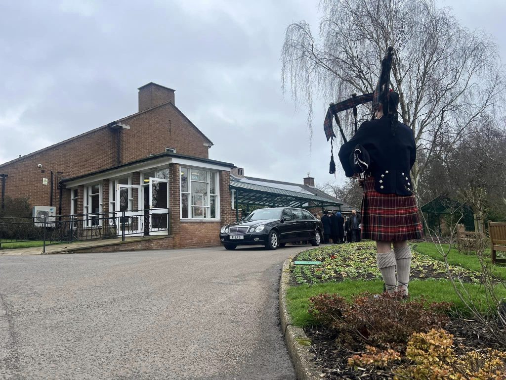 Leeds funeral bagpiper