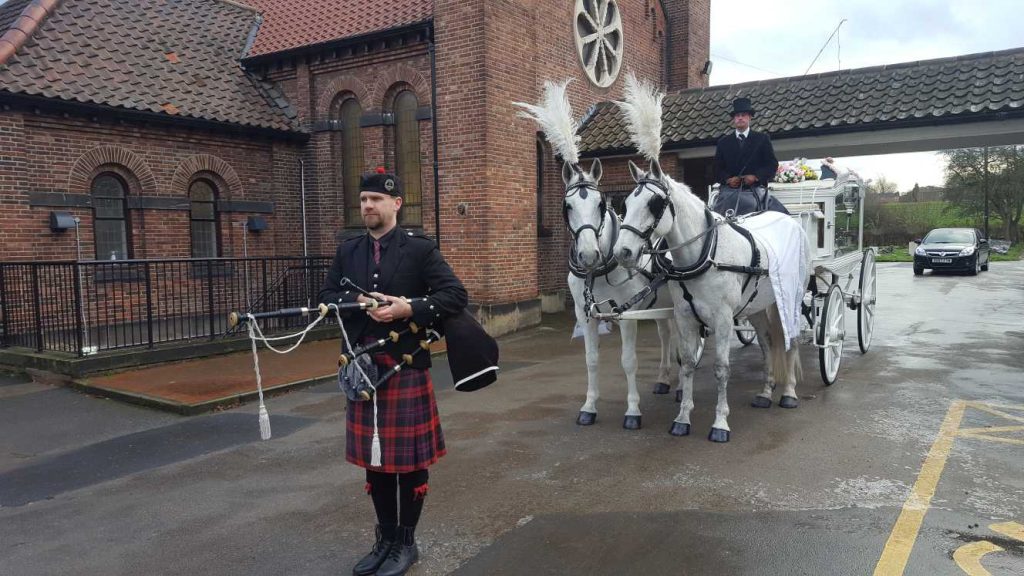 cottingley crematorium bagpiper